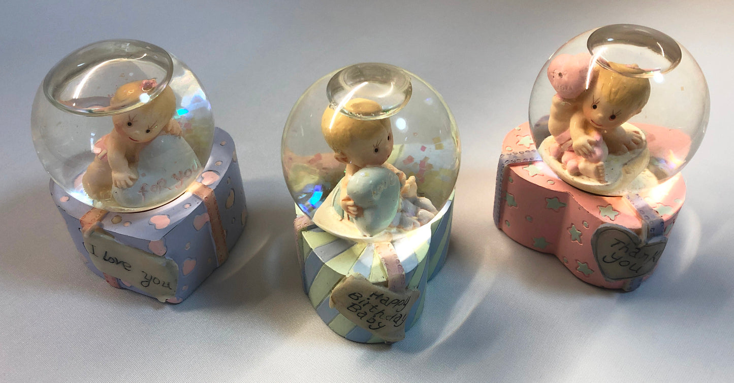 Pretty Parcel Baby Glitter Ball on Heart Base