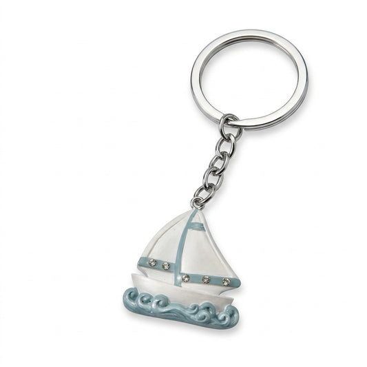 A nautical-themed keychain featuring a white and light blue sailboat charm, displayed on a blue plate with starfish props alongside its gift box and heart-shaped thank you tag.