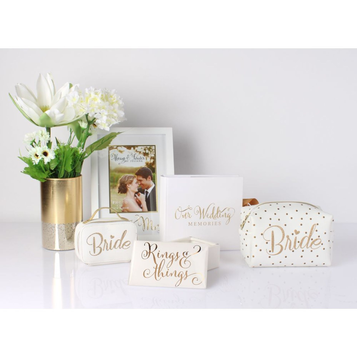 White “Our Wedding Memories” wedding photo album with gold foil title on display