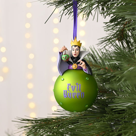 Evil Queen green glass bauble ornament with purple ribbon, hanging on a tree