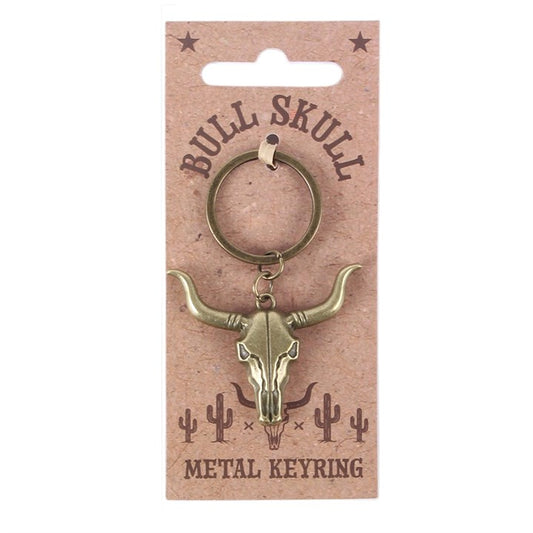 Gold-tone metal bull keyring with circular ring and horned skull pendant