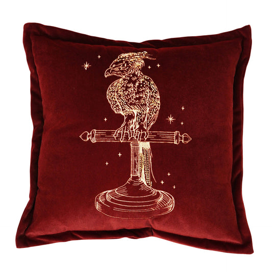 Maroon velvet cushion with gold phoenix Fawkes emblem and wand-style stand