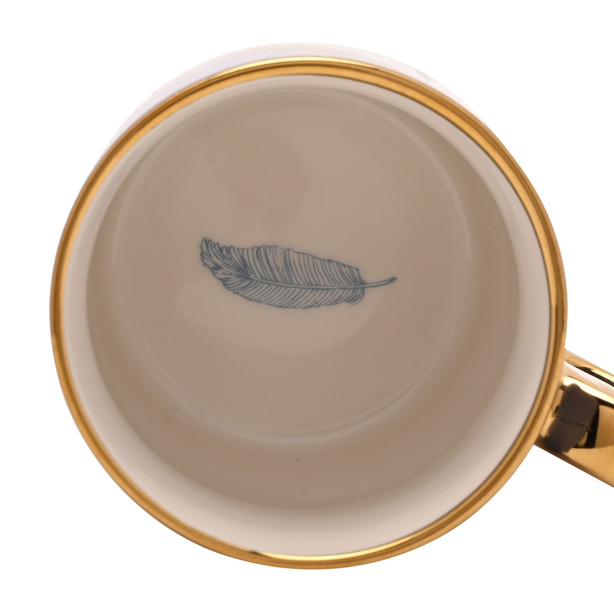 Blue ceramic mug bottom with gold rim and blue feather design.