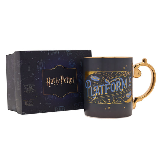 Dark gray collectible mug with gold handle, Platform 9 3/4 print, shown with box.