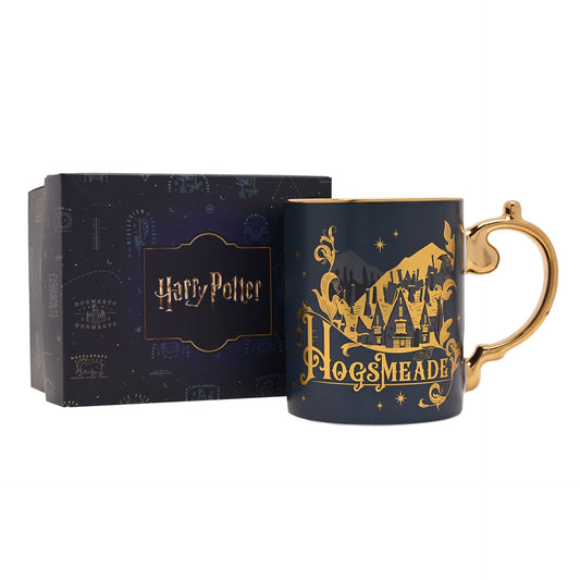 Collectible navy mug with gold Hogsmeade skyline, shown with gift box
