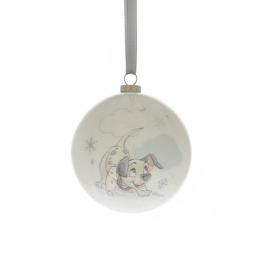 Round Christmas bauble with a blue animal character illustration and snowflake accents, hanging loop