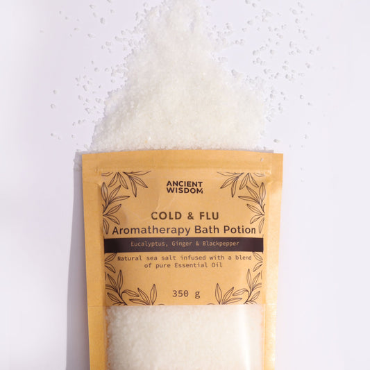 Kraft pouch bath potion label reading Cold & Flu, Eucalyptus, Ginger, Blackpepper