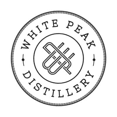 White Peak Distillery circular logo with stylized emblem, black ink on white