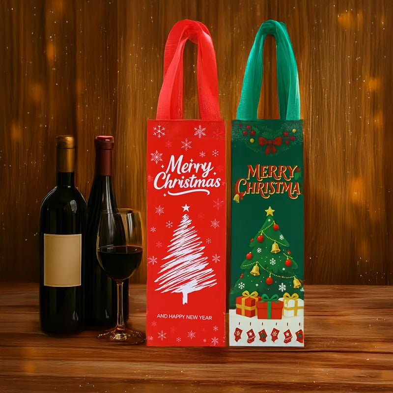 Two Christmas-themed gift bags standing on a wooden table, with wine bottles and a glass of red wine beside them against a warm wood-paneled background. One bag is red with white snowflakes and a white Christmas tree, and the other is green with a decorated Christmas tree, gifts, and stockings.