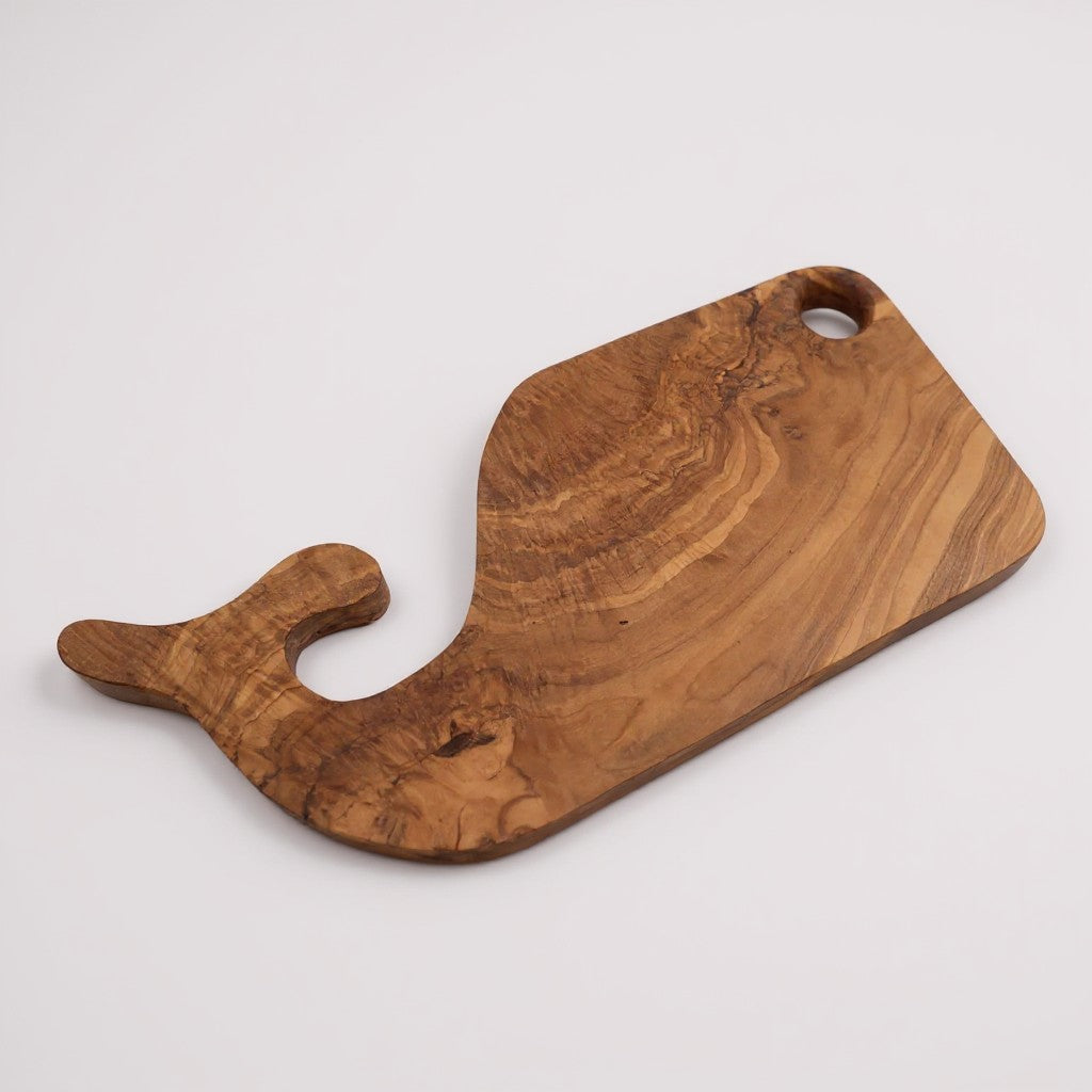 Fish-shaped wooden cutting and serving board with a hanging handle hole