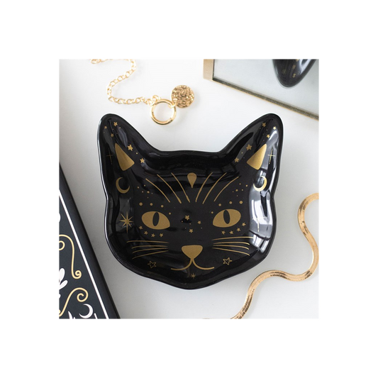 Black ceramic trinket dish shaped like a cat face with gold celestial accents