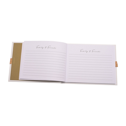 Opened wedding guest book with two lined pages for "Family & Friends"