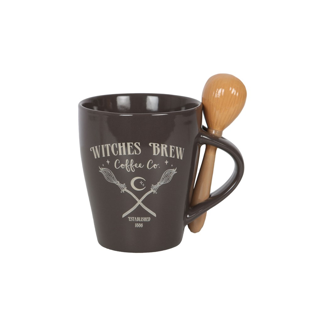 Brown mug with 'Witches Brew Coffee Co.' text and wooden spoon on a white background