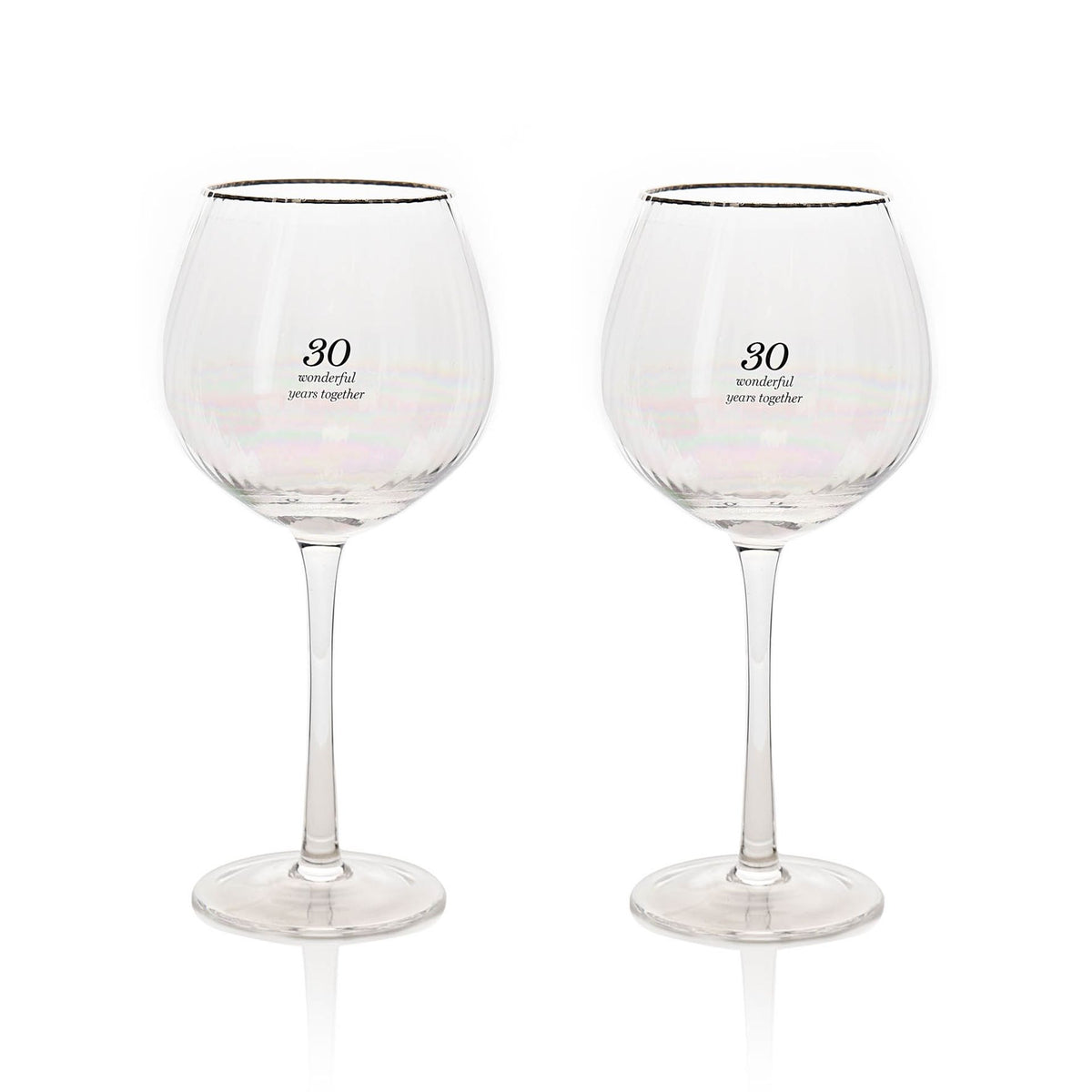Pair of stemmed gin glasses with gold rim and 30 label on bowl
