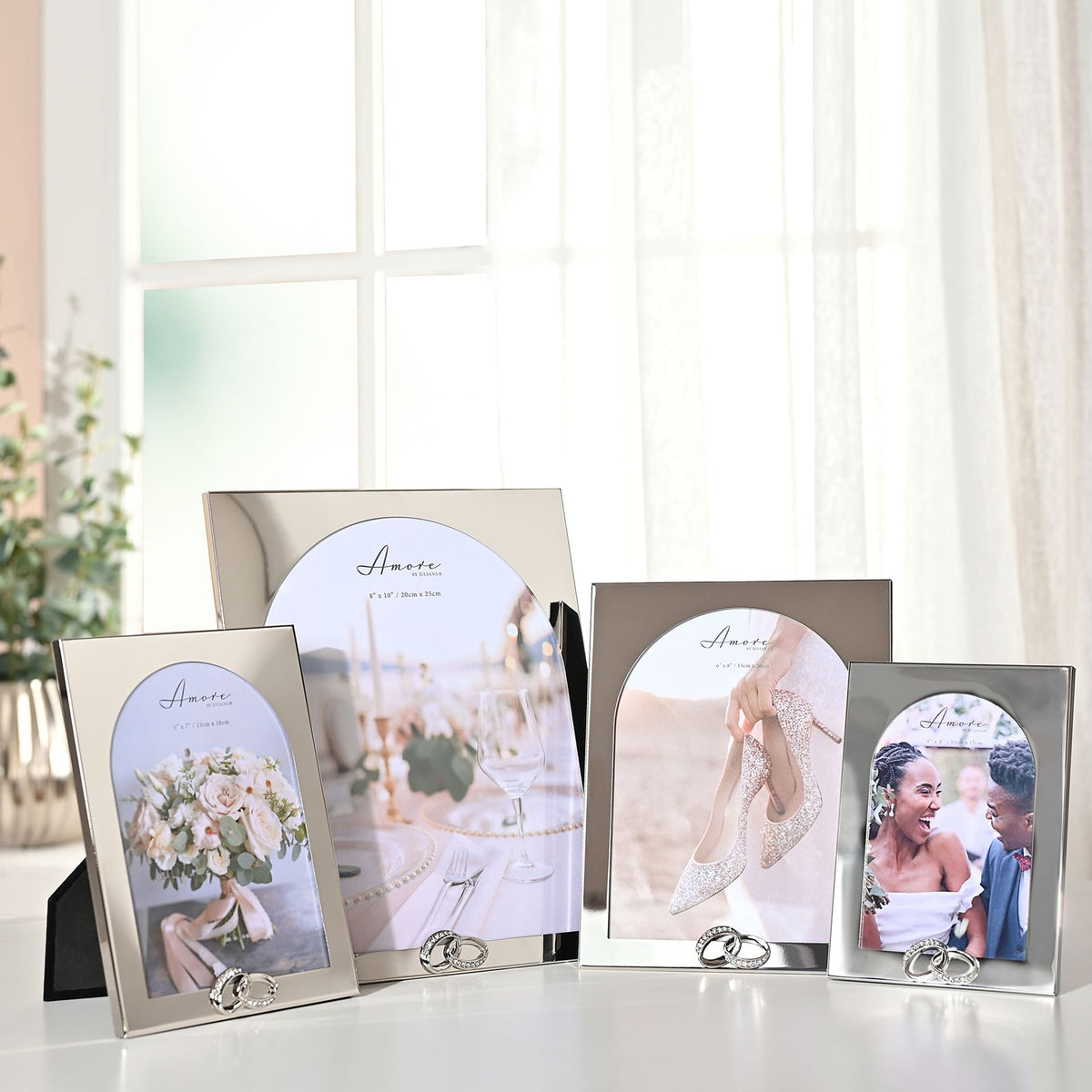 Set of arch 4x6 photo frames with silver-tone rings, tabletop display