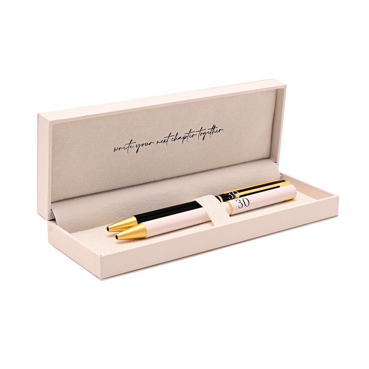 Gift box with two personalized pens, one black and one white, gold accents