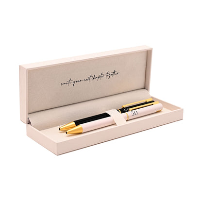 Set of 2 anniversary pens in black and pale pink, in open keepsake gift box