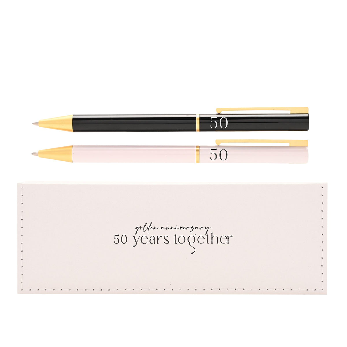 Two anniversary pens, black with gold trim and pale pink barrel, with gift box