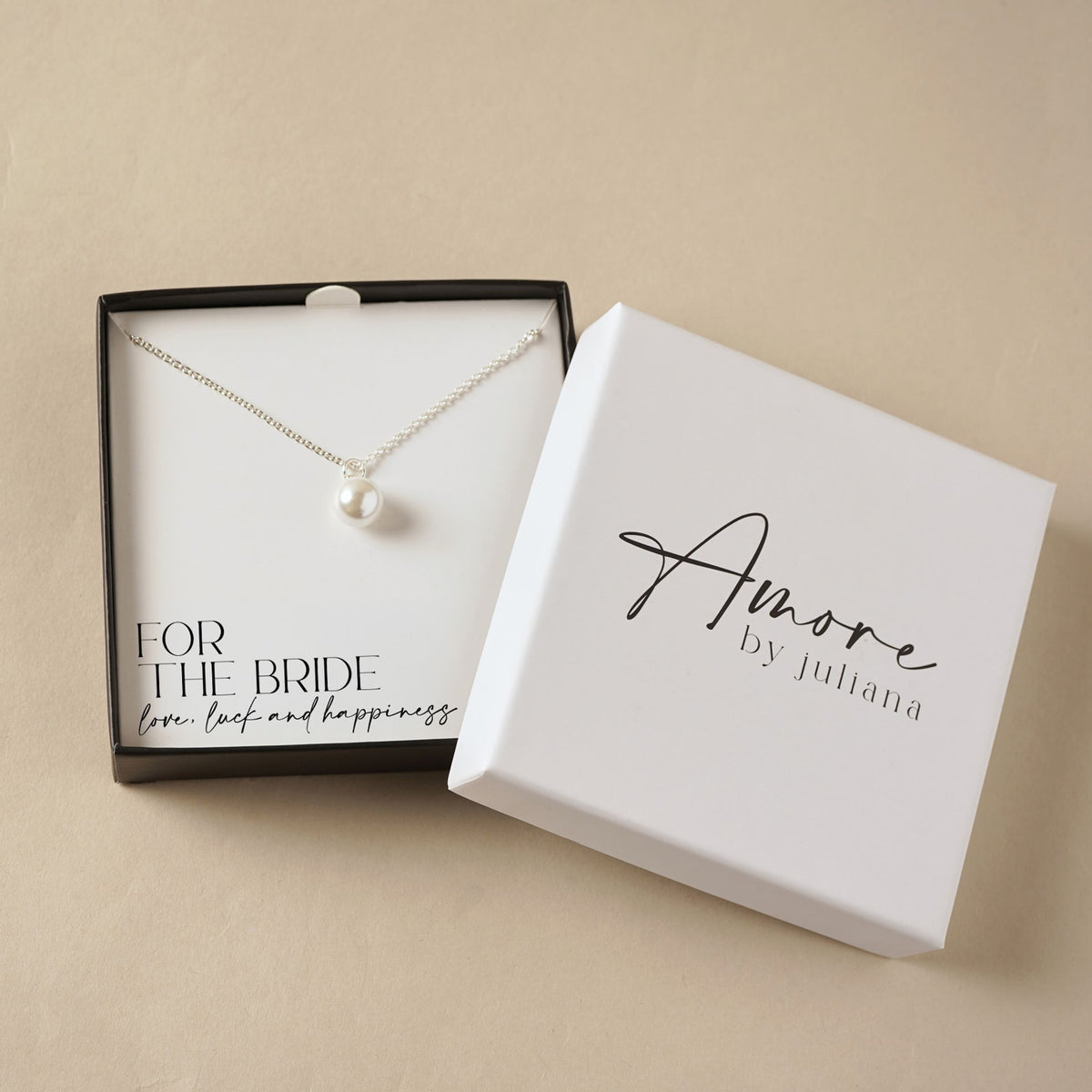 Silver-plated faux pearl drop necklace on gift box with bride message card