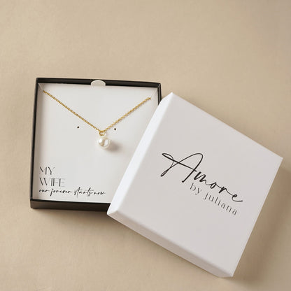 Gold plated necklace with faux pearl pendant, shown in a gift box with card