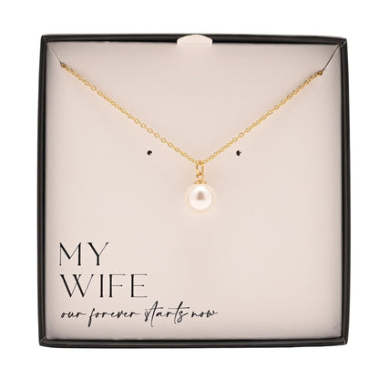 Gold plated necklace with faux pearl pendant centerpiece and short chain