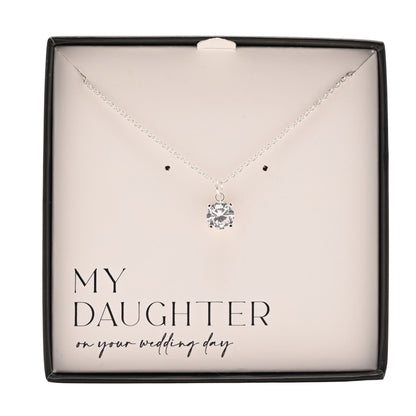 Silver-tone crystal pendant necklace displayed in a black gift box tray