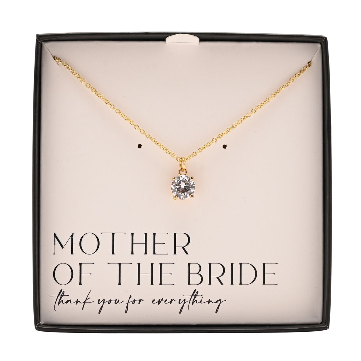 Gold-plated necklace with round crystal pendant centered in gift box