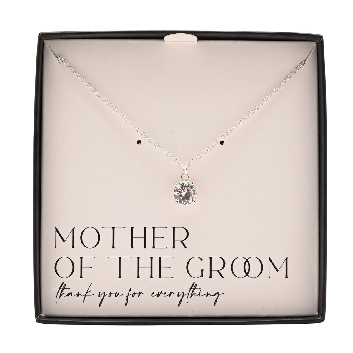 Silver-plated necklace with round crystal pendant lying in gift box