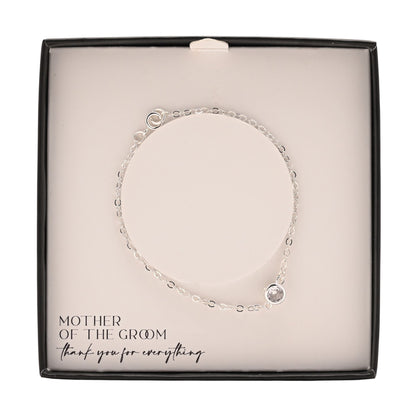 Silver-plated bracelet with round center charm inside black gift box