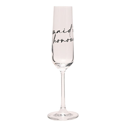 Champagne flute with “maid of honour” black lettering on the glass bowl