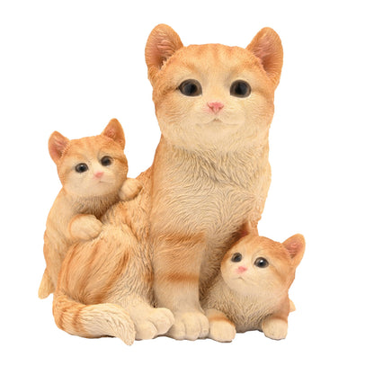 Orange tabby cat family figurine with three kittens, mother standing upright