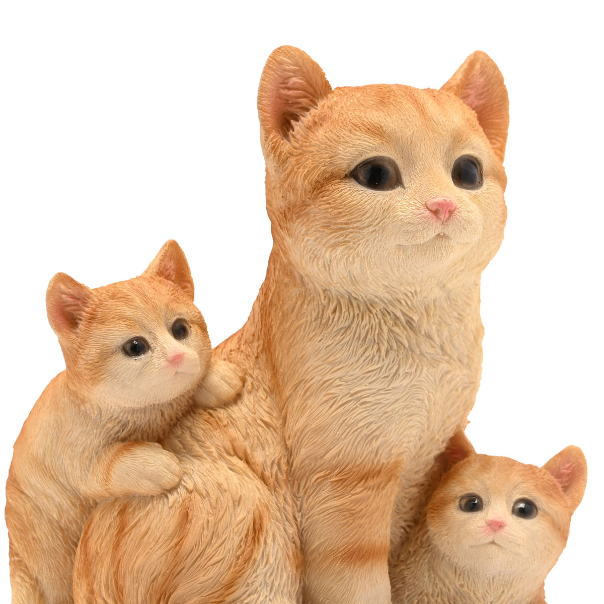 Orange tabby cat family figurine, mother cat with two kittens in close-up