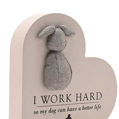 Heart plaque detail with gray dog figure and quote “I WORK HARD so my dog can have a better life”