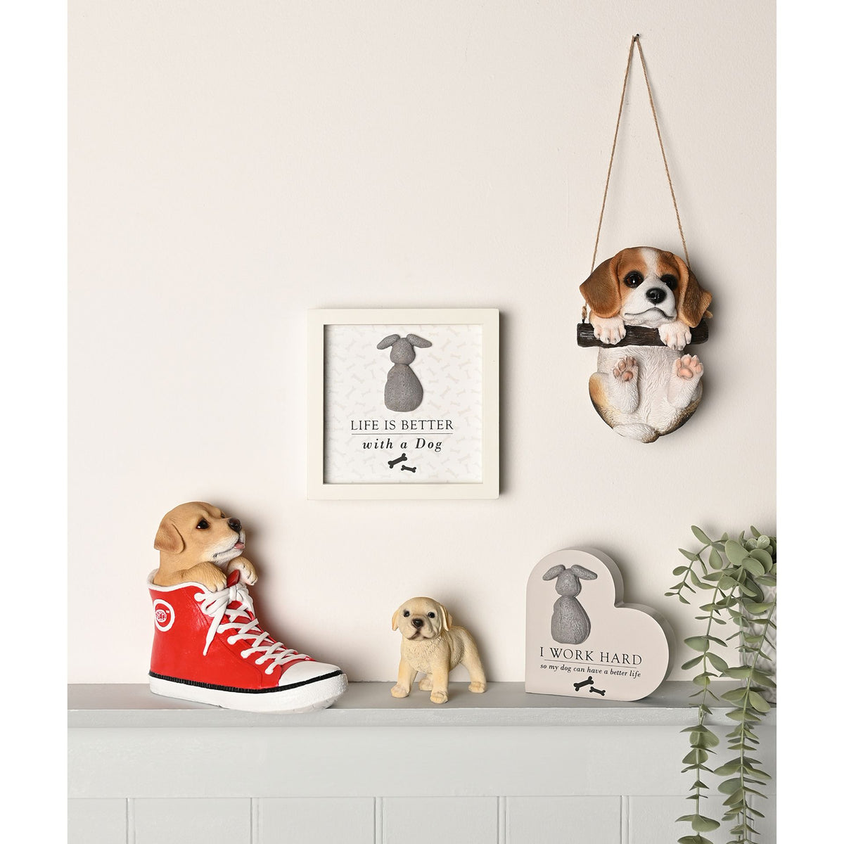 Heart-shaped dog plaque with gray dog figure and quote, “I WORK HARD so my dog can have a better life”