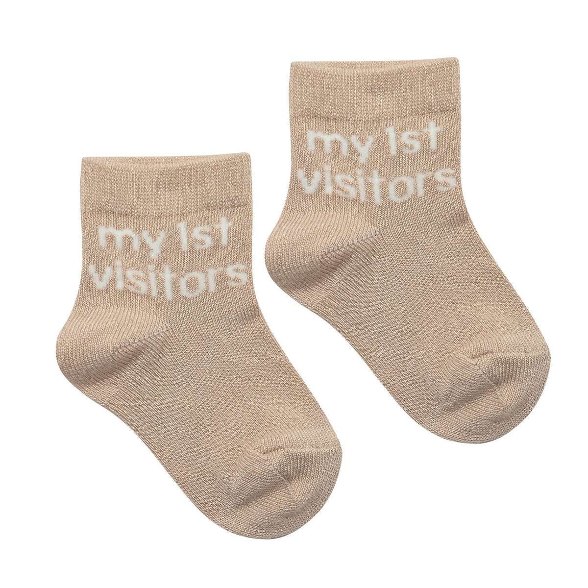 Pair of beige baby socks with "my 1st visitors" text on cuff