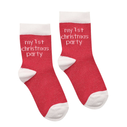 Pair of red baby socks with white toes and cuff, “my 1st Christmas party”