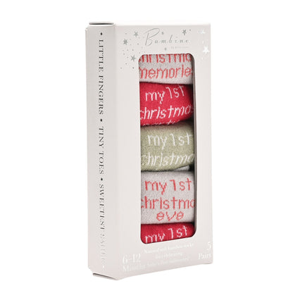 Box showing five pairs of baby Christmas-themed socks with a window display