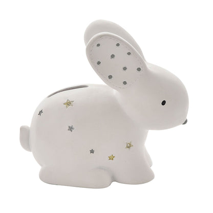 White resin rabbit money box, coin slot on back, stars and dots on body