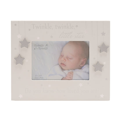 Baby photo frame with star decorations and centered photo window, keepsake gift