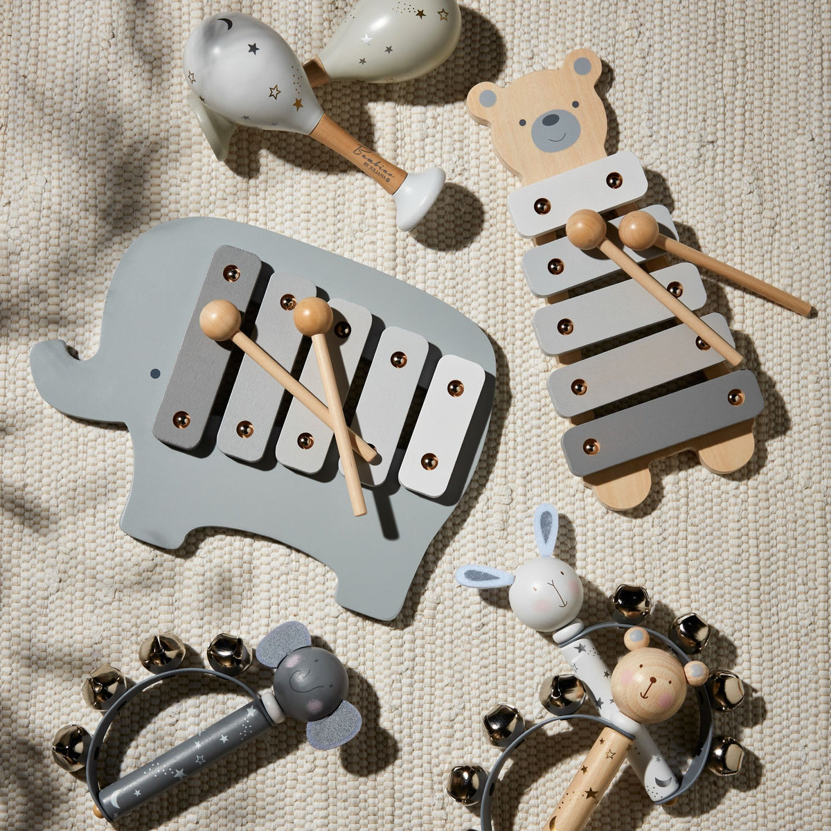 Elephant wooden xylophone with five bars and two wooden mallets on play surface