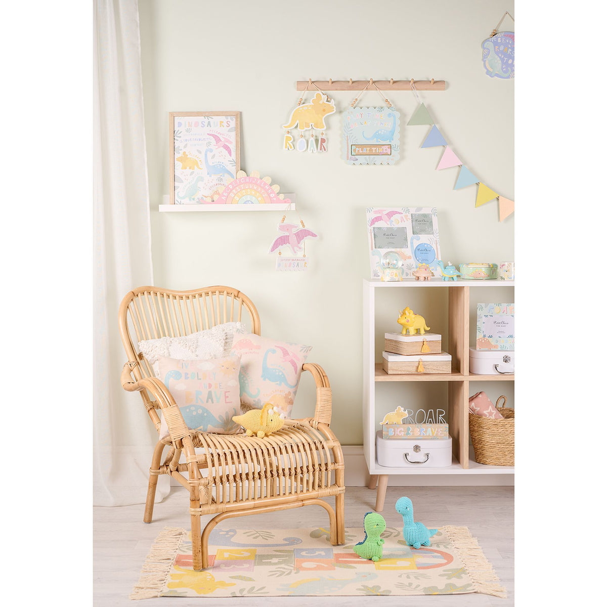 Dinosaur keepsake box on shelf with yellow tassel charm