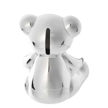 Silver-plated teddy bear money box figurine, front view with central slot
