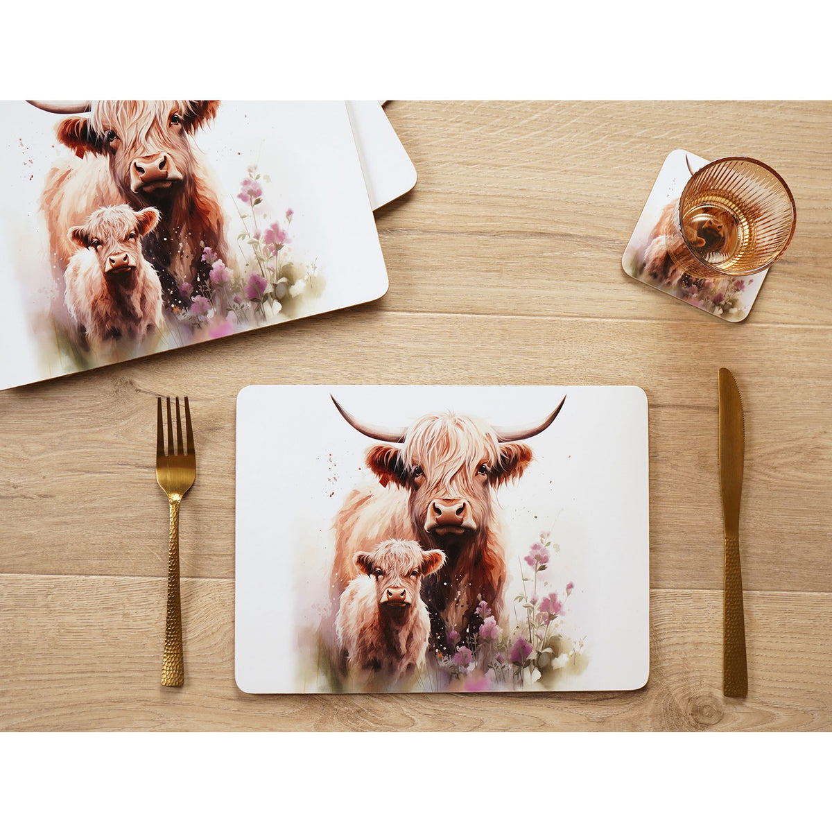 Rectangular placemat with Highland cow and calf illustration and pink flowers on light background