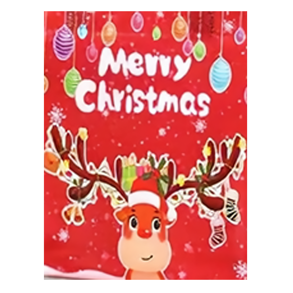 A festive red Christmas  gift bag design with the words “Merry Christmas” in white at the top, hanging ornaments, snowflakes, and a cartoon reindeer with antlers and a Santa hat near the bottom.