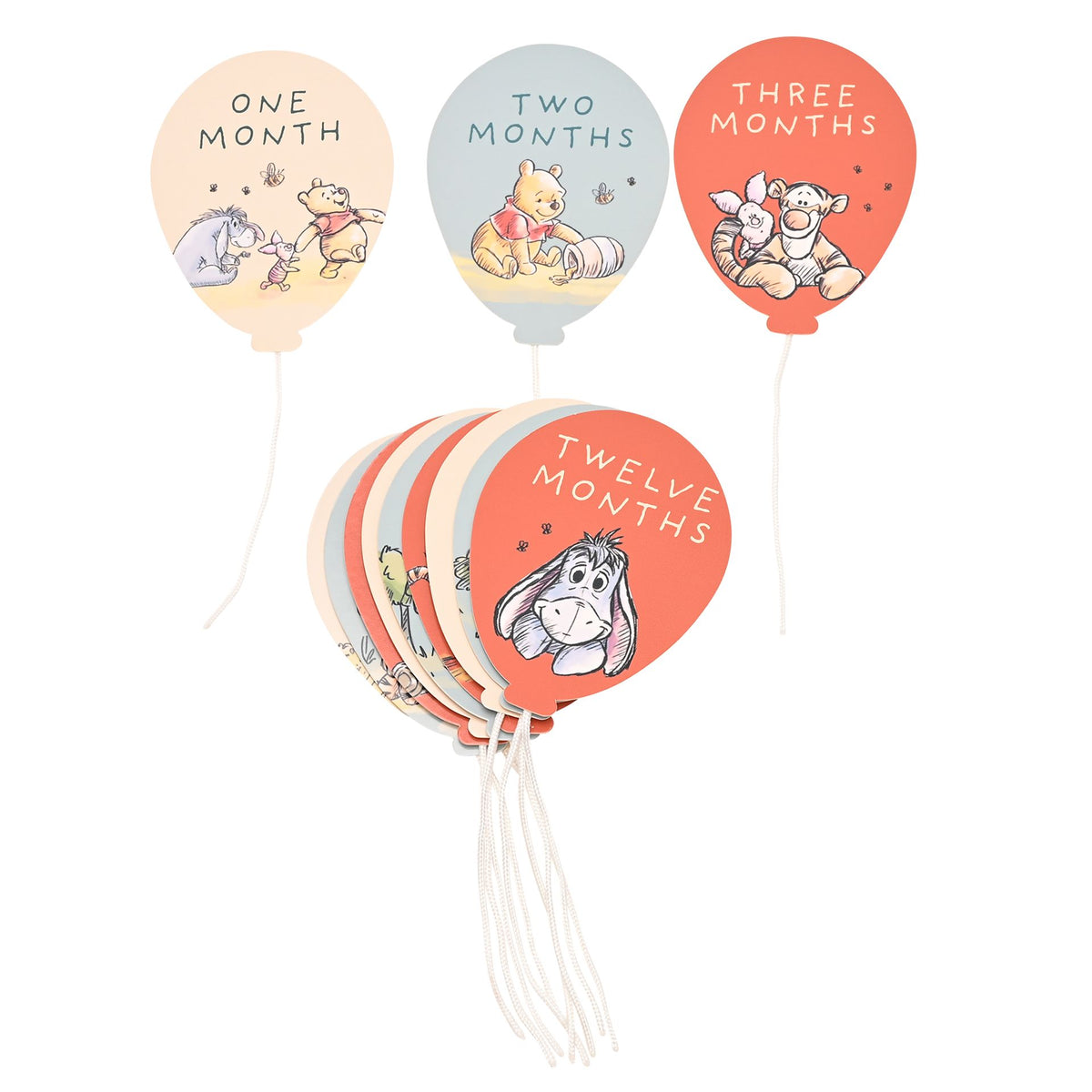 Set of circular month stickers: One, Two, Three, and Twelve Months, with strings attached