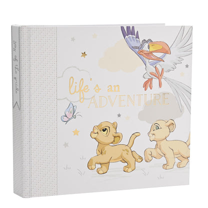 Photo album front cover with Simba lion cubs and stork illustration; textured side panel