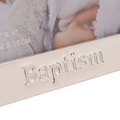 Close-up of raised 'Baptism' word on silver enamel photo frame front.