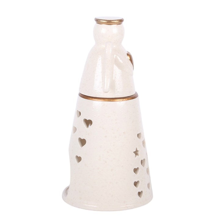 Angel oil burner, side view with gold-rim top and heart cutout pattern