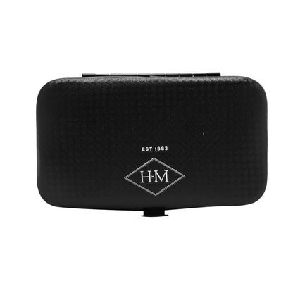 Black HM manicure gift set case with hinged clasp and diamond crest logo