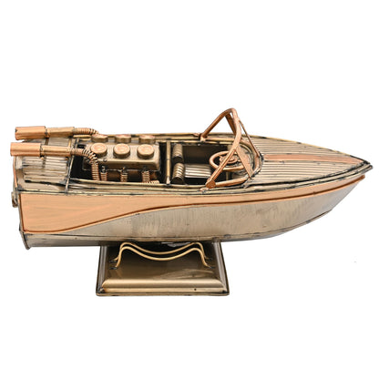 Speed boat ornament with copper front frame, striped deck, and molded hull